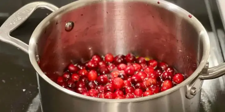 Crush the fresh cranberry