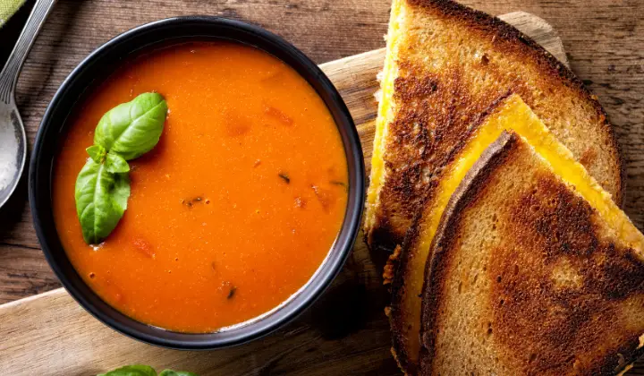 Delicious tomato soap in a bowl with bread