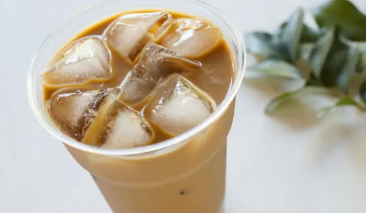 Glass filled with Iced Coffee by Herbalife